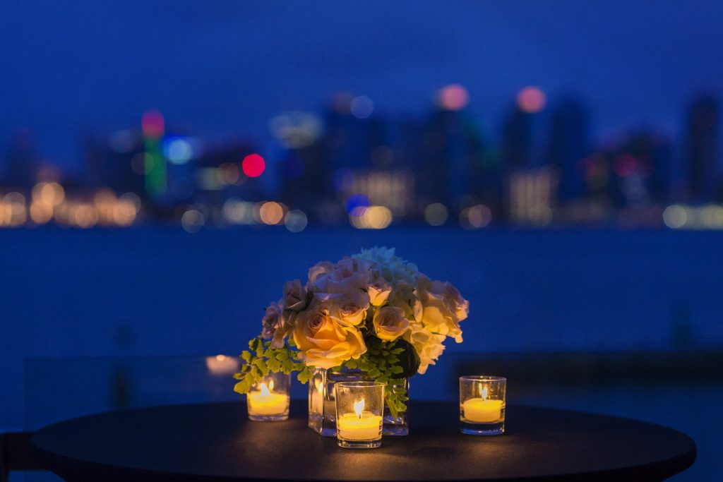 Bouquet and candles at night