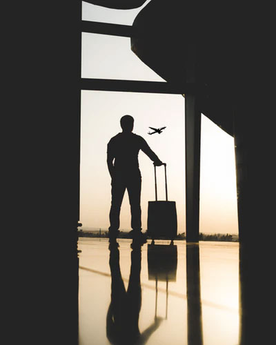 Man with suitcase at airport