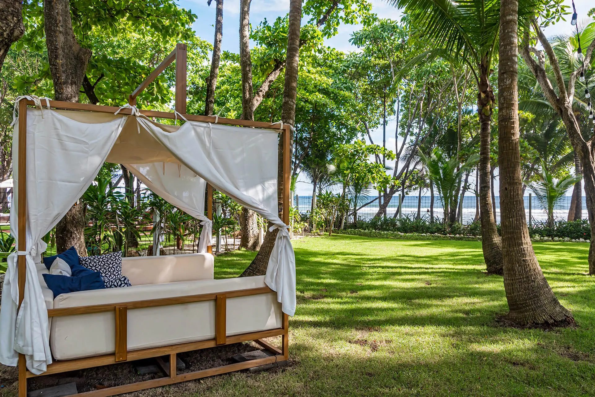 Luxury villas with comfortable daybed facing the beach in Santa Teresa, Costa Rica