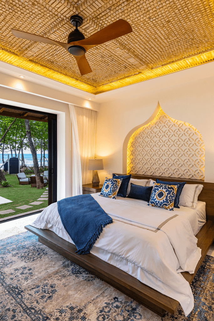 One of Casa Teresa Luxury Villas’ main house bedrooms with luxury Moroccan-style furnishings and ocean views