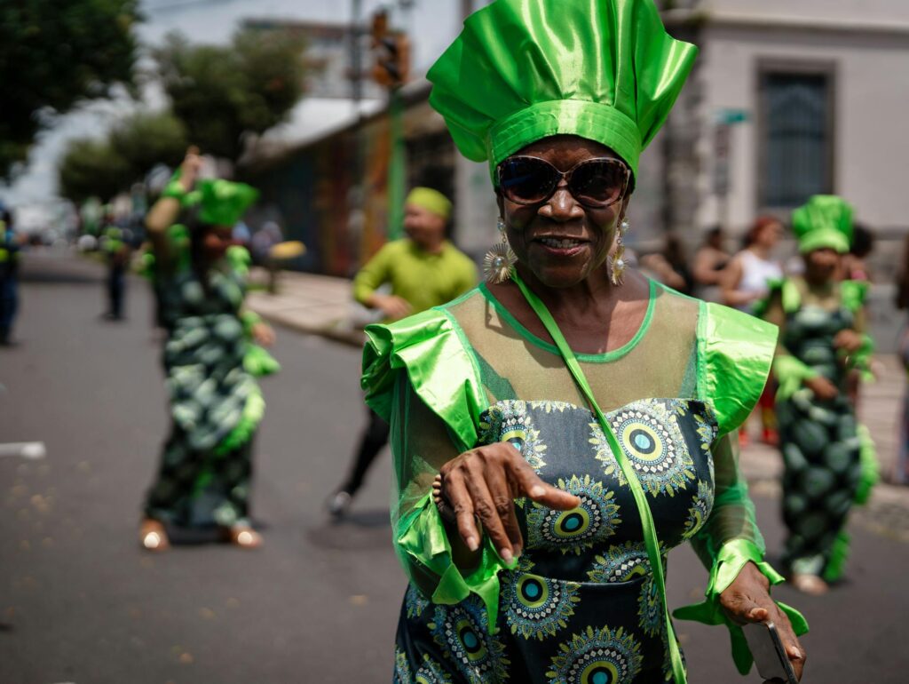 Elderly African diaspora festival dancers on a Costa Rican street